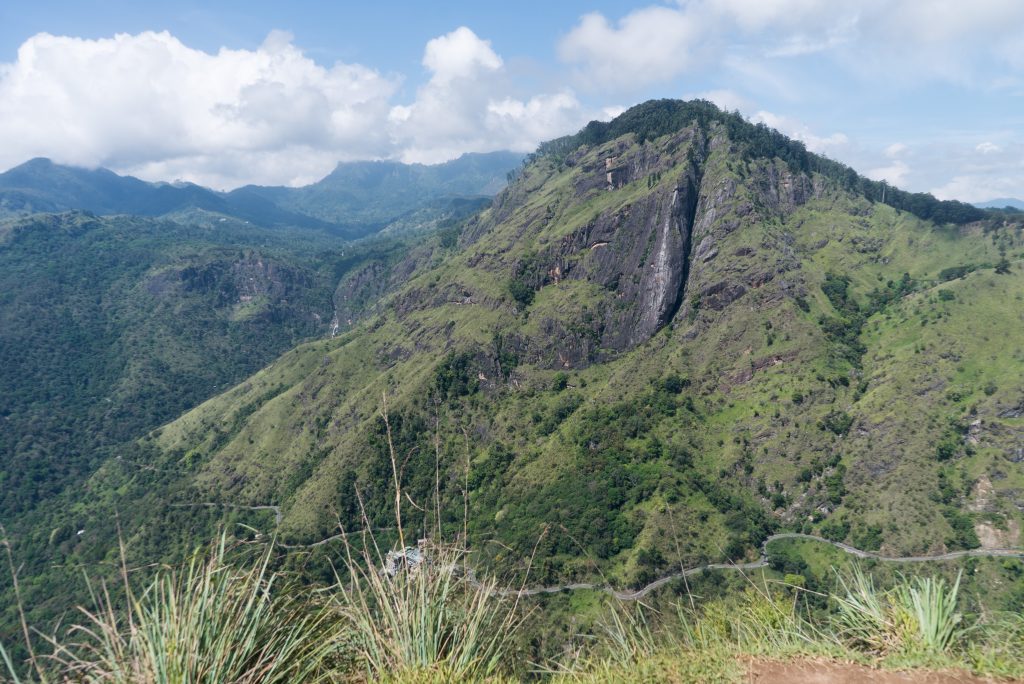 Ella Rock's steep cliff face seen across the valley from Little Adam's Peak